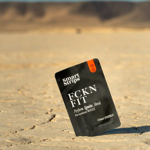 Smart Strips FCKN FIT oral dissolvable strips, sachet standing in the desert